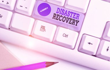 Kelime yazımı Felaket Kurtarma. Ciddi zarar verici olaylardan etkilendiğini gösteren iş konsepti.