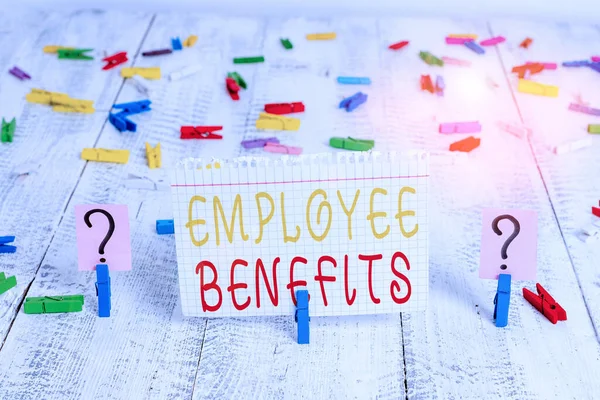 Word writing text Employee Benefits. Business photo showcasing indirect and noncash compensation paid to an employee Scribbled and crumbling sheet with paper clips placed on the wooden table