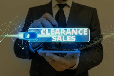 Giriş iznini gösteren bir yazı. Fiyatları düşürüp gereksiz hisselerden kurtulmak için iş fotoğraflarında mallar sergileniyor.