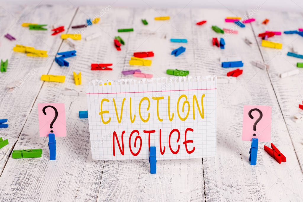 Word writing text Eviction Notice. Business photo showcasing an advance notice that someone must leave a property Scribbled and crumbling sheet with paper clips placed on the wooden table