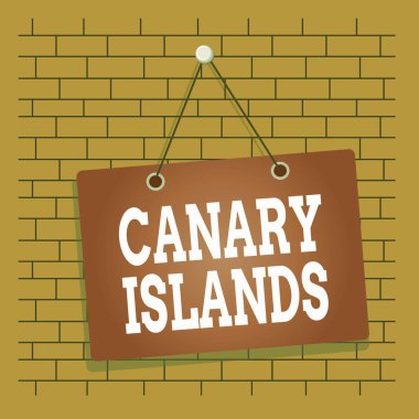 Mesaj işareti Kanarya Adalarını gösteriyor. Atlantik Okyanusu 'ndaki bir grup dağlık adayı gösteren iş fotoğrafı. Renkli not defteri. Boş tahta boş alan arka plan dikdörtgenini ekliyor.