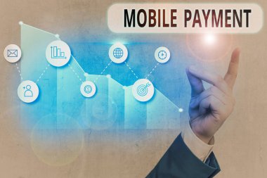 Cep telefonu ödemesini gösteren metin işareti. Ödemenin taşınabilir elektronik cihazla yapıldığı kavramsal fotoğraf.