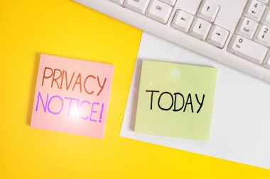 Handwriting text writing Privacy Notice. Concept meaning fulfils a legal requirement to protect a customer or client Paper with copy space and keyboard above orange background table.