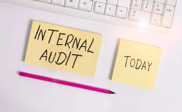 Conceptual hand writing showing Internal Audit. Business photo showcasing evaluating and improving the effectiveness of risk management Flat lay above copy space sticky notes with business concept. — Stock Photo, Image