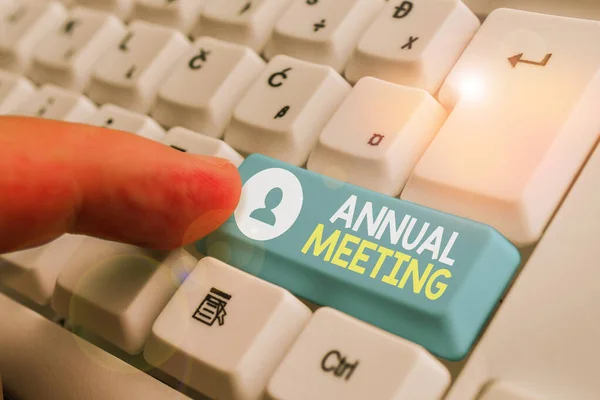 Handwriting text writing Annual Meeting. Concept meaning a meeting of the general membership of an organization.