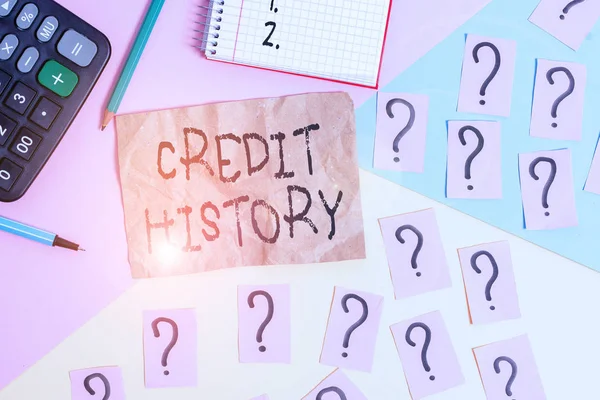 Word writing text Credit History. Business concept for record of a borrower s is responsible repayment of debts Mathematics stuff and writing equipment above pastel colours background.