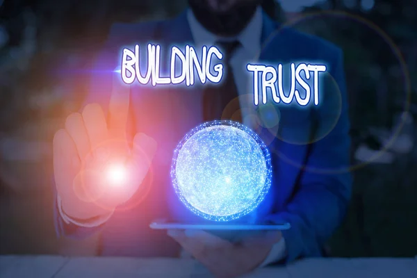 Text sign showing Building Trust. Conceptual photo activity of emerging trust between showing to work effectively Elements of this image furnished by NASA.