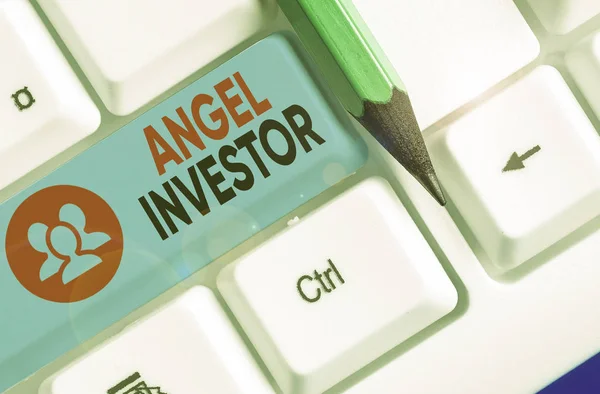 Testo scritto a mano Angel Investor. Concetto che significa alto patrimonio netto individuo che fornisce sostegno finanziario . — Foto Stock