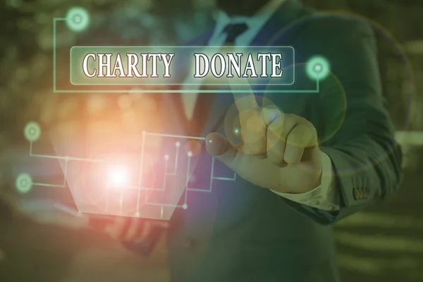 Texto de escritura de palabras Caridad Donar. Concepto de negocio para regalo hecho por un individuo a una organización sin fines de lucro . —  Fotos de Stock