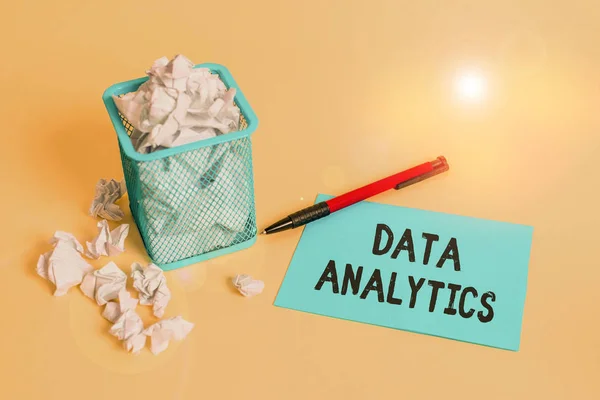 Word writing text Data Analytics. Business concept for process of examining data sets in order to draw conclusions crumpled paper trash and stationary with note paper placed in the trash can. — Stok fotoğraf