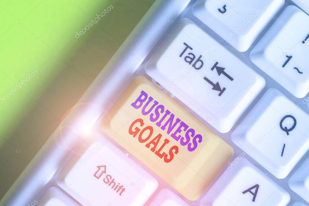 Handwriting text Business Goals. Concept meaning company expects to accomplish over a specific period of time.