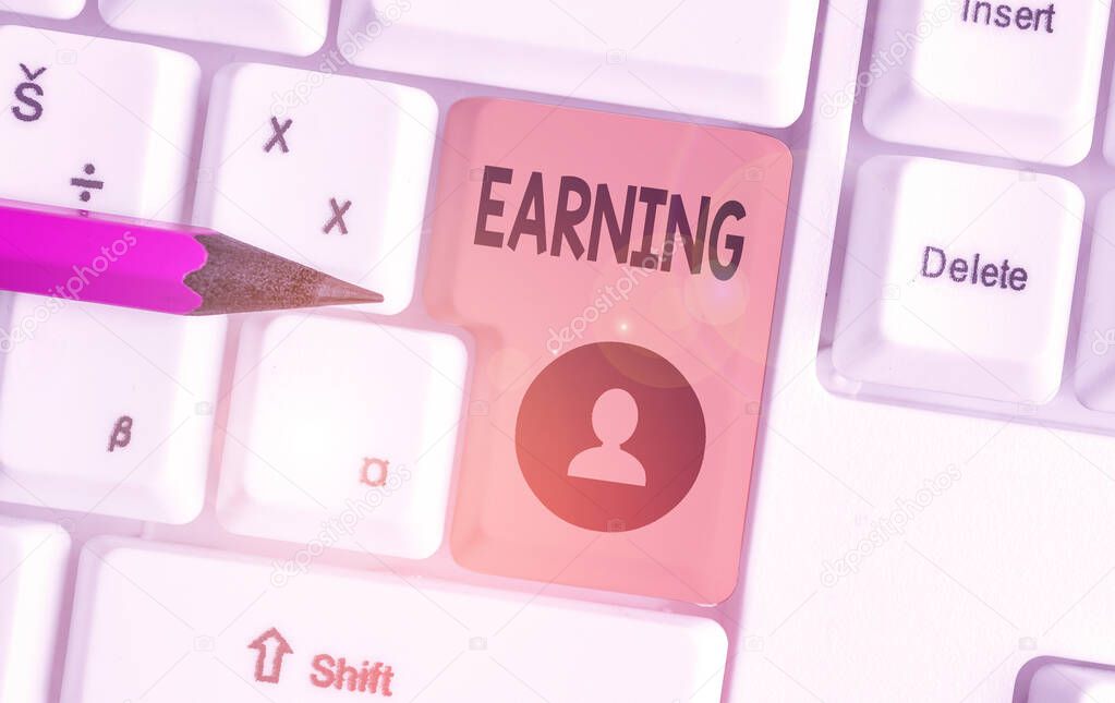 Text sign showing Earning. Conceptual photo something earned as compensation for labor or the use of capital.