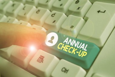 Handwriting text writing Annual Check Up. Concept meaning a thorough physical medical examinantion held every year.