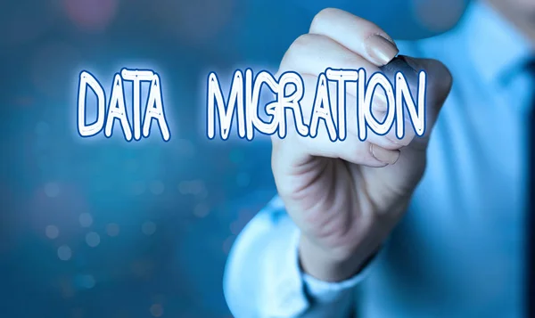 Word writing text Data Migration. Business concept for process of transferring data between data storage systems.