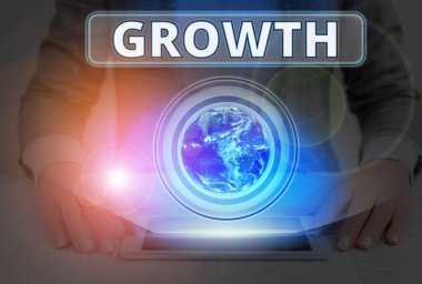 Metin işareti büyümeyi gösteriyor. Bu görüntünün yaşlanmakta olan elementlerini Nasa 'nın mobilyaladığı boyutu ve meyve suyunu arttıran kavramsal fotoğraf süreci.