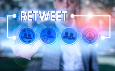 Conceptual hand writing showing Retweet. Business photo showcasing in twitter repost or forward a message posted by another user.
