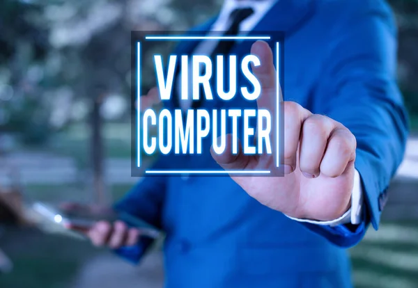 Написання текстів Вірус Комп'ютер. Концепція, що означає шкідливе програмне забезпечення, завантажене на користувача s комп'ютер бізнесмен з вказівним пальцем перед ним . — стокове фото