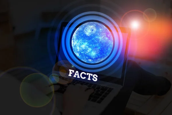 Handwriting text Facts. Concept meaning information used as evidence or part of report news article blog Elements of this image furnished by NASA. — Stock Photo, Image