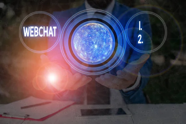 Text sign showing Webchat. Conceptual photo system that allows users to communicate in real time using internet Elements of this image furnished by NASA. — Stock Photo, Image