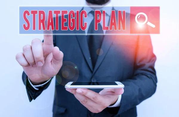 Writing note showing Strategic Plan. Business photo showcasing analysisagement activity that is used to set and focus priorities. — Stock Photo, Image