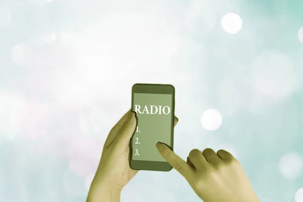 Writing note showing Radio. Business photo showcasing activity or industry of broadcasting sound programmes to the public. — Stock Photo, Image