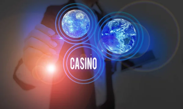 Signo de texto que muestra Casino. Foto conceptual un edificio donde se juegan juegos especialmente ruleta y juegos de cartas Elementos de esta imagen proporcionados por la NASA . — Foto de Stock