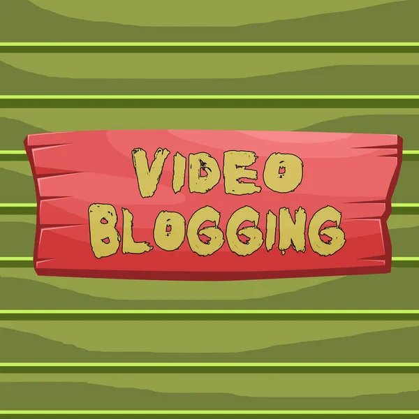 Εννοιολογικό χειρόγραφο που δείχνει το Video Blogging. Επαγγελματική φωτογραφία εμφάνιση μορφή του blog για την οποία το μέσο είναι βίντεο Web τηλεόραση Ξύλινο πίνακα ορθογώνιο σχήμα ξύλου επισυνάπτεται φόντο χρώμα. — Φωτογραφία Αρχείου
