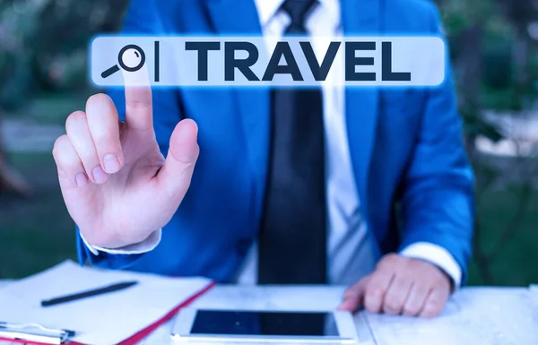 Handwriting text Travel. Concept meaning the movement of showing between distant geographical locations Businessman with pointing finger in front of him. — Stockfoto
