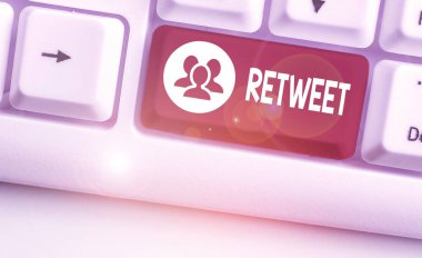 Conceptual hand writing showing Retweet. Business photo showcasing in twitter repost or forward a message posted by another user.