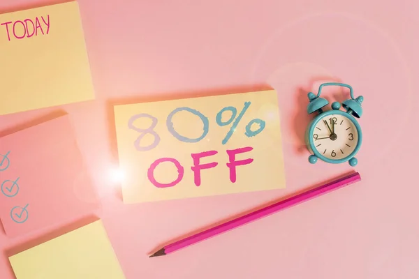 Conceptual hand writing showing 80 Percent Off. Business photo showcasing 80 percent reduction on the original price of a product Four multicolor notepads marker alarm clock color background. — Stock Photo, Image