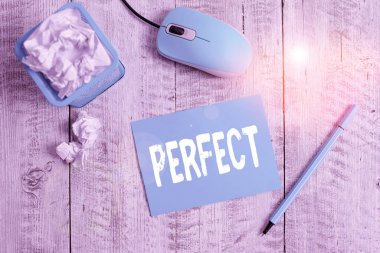 Text sign showing Perfect. Conceptual photo Having all required desirable elements qualities characteristics Crumpled paper in bin and computer mouse with stationary on wooden backdrop.