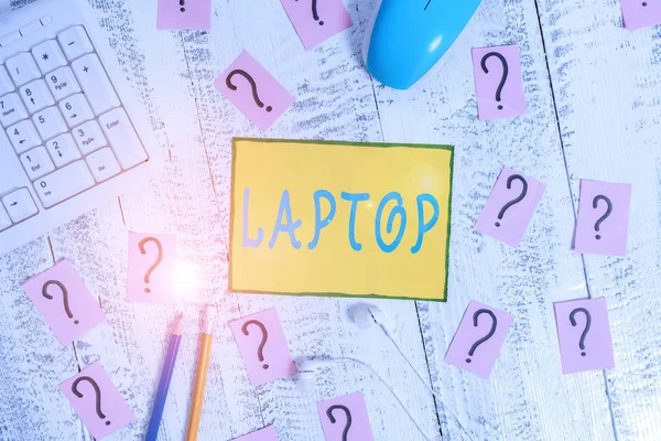 Text sign showing Laptop. Conceptual photo computer that is portable and suitable for use while travelling Writing tools, computer stuff and scribbled paper on top of wooden table. — Φωτογραφία Αρχείου