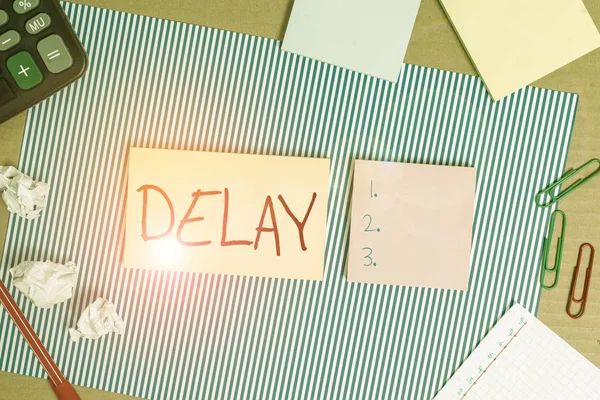 Conceptual hand writing showing Delay. Business photo showcasing Unplanned deferment of a scheduled activity because of some thing Striped paperboard cardboard office study supplies chart. — Stok fotoğraf