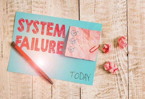 Conceptual hand writing showing System Failure. Business photo showcasing Occur because of a hardware failure or a software issue Wrinkle paper and cardboard placed above wooden background. — 스톡 사진