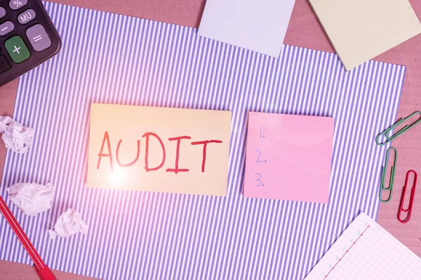 Conceptual hand writing showing Audit. Business photo showcasing Distinctive typically pleasant smell Subtle of a particular type Striped paperboard cardboard office study supplies chart. — Stockfoto