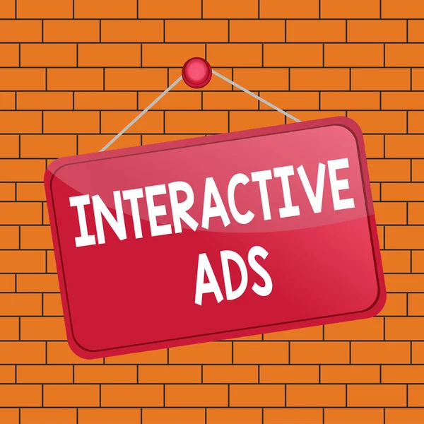 Text sign showing Interactive Ads. Conceptual photo uses interactive media to communicate with consumers Colored memo reminder empty board blank space attach background rectangle. — Stock Fotó