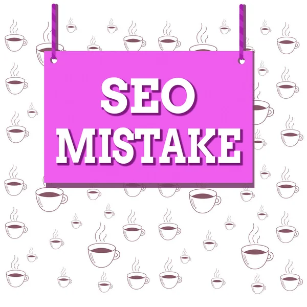 Writing note showing Seo Mistake. Business photo showcasing action or judgment that is misguided or wrong in search engine Wooden board wood empty frame fixed colorful striped string. — Stockfoto