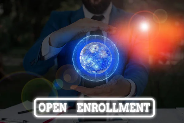 Conceptual hand writing showing Open Enrollment. Business photo text policy of allowing qualifying students to enroll in school Elements of this image furnished by NASA. — Zdjęcie stockowe