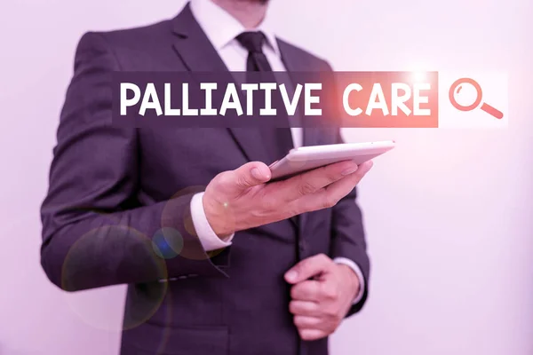 Text sign showing Palliative Care. Conceptual photo specialized medical care for showing with a serious illness Male human wear formal work suit hold smart hi tech smartphone use one hand.