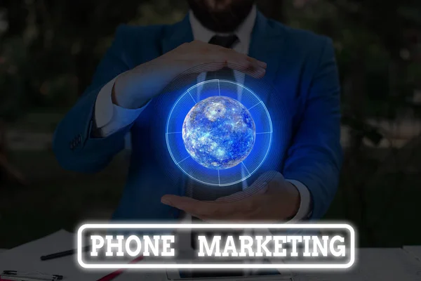 Conceptual hand writing showing Phone Marketing. Business photo text art of promoting products and services via mobile devices Elements of this image furnished by NASA. — Stok fotoğraf