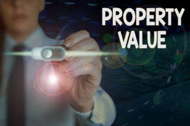 Özellik Değeri el yazısı metni. Kavram anlamı, verilen bir mülkün piyasa değerini ifade eder.