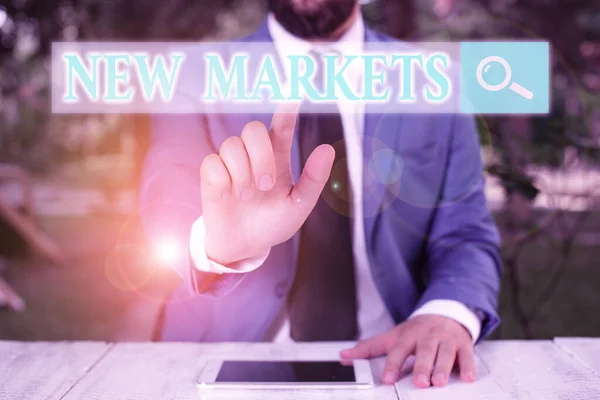 Handwriting text writing New Markets. Concept meaning market where the end product or service is new or not exist yet. — Stockfoto