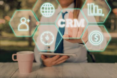Handwriting text writing Crm. Concept meaning Strategy for analysisaging the Affiliation Interactions of an organization.