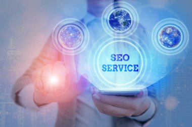 Handwriting text writing Seo Service. Concept meaning suite of techniques and procedures to surge website visibility.