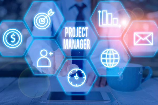 Writing note showing Project Manager. Business photo showcasing overall charge of the planning and execution of a project. — Stockfoto