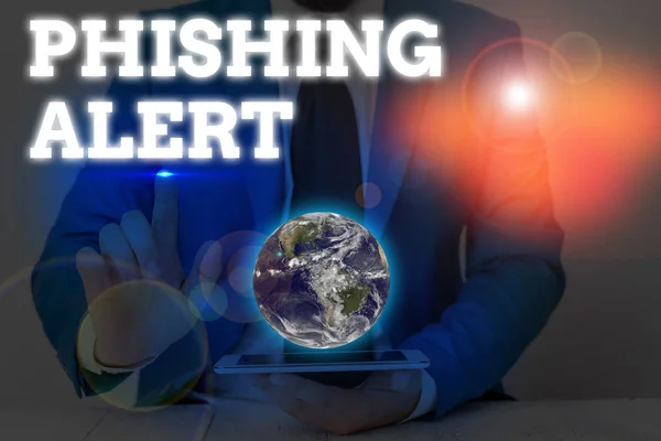 Writing note showing Phishing Alert. Business photo showcasing Be cautious to fraudulent attempt to obtain subtle facts Elements of this image furnished by NASA. — стокове фото