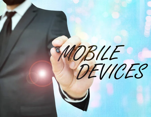 Conceptueel handschrift met Mobile Devices. Zakelijke foto presentatie van draagbare computerapparatuur, zoals een smartphone of tablet. — Stockfoto
