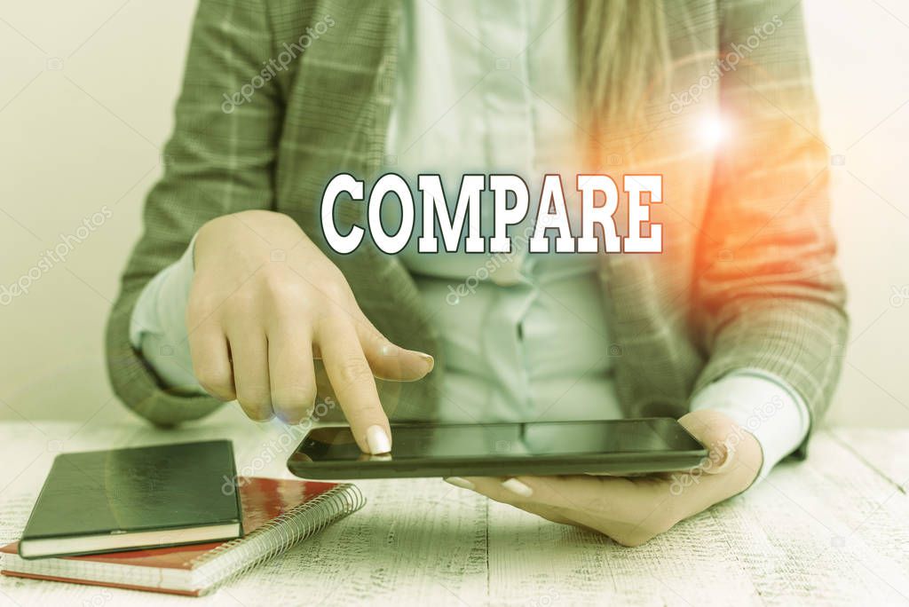 Writing note showing Compare. Business photo showcasing Estimate Measure Note the similarities dissimilarities between Business concept with communication mobile phone.