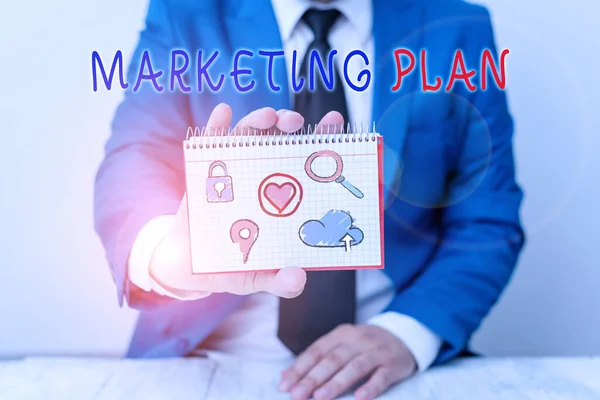 Nota scritta che mostra il Piano di Marketing. Foto aziendale che presenta un documento operativo che delinea una strategia pubblicitaria . — Foto Stock