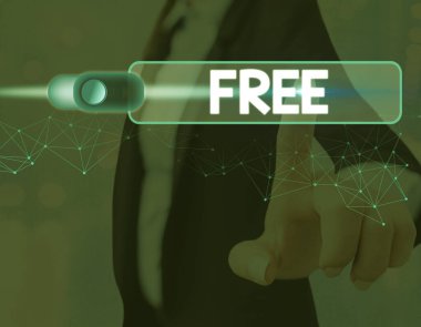 Handwriting text Free. Concept meaning Enjoying demonstratingal rights and liberty Not under any control and power.